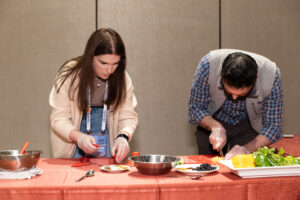 March 05 | Activities: Team Refried Rangers chops their ingredients in the Tex Mex Iron Chef challenge